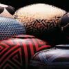 Photograph of round colorful ceramic pots