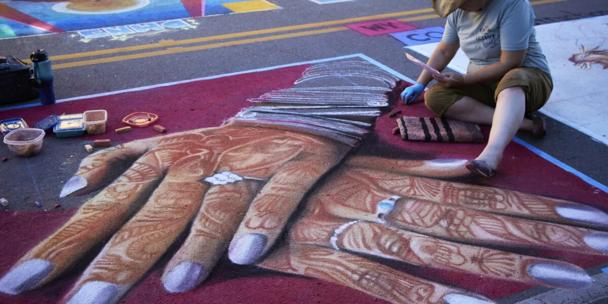 chalk drawing of human hands
