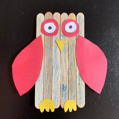 Owl made of popsicle sticks, glue and paper